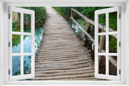 Fototapeta Naklejka Na Ścianę Okno 3D - Plitvice, Croatia - Wooden walkway in Plitvice Lakes National Park on a bright summer day with crystal clear turquoise water, small waterfalls and green summer foliage