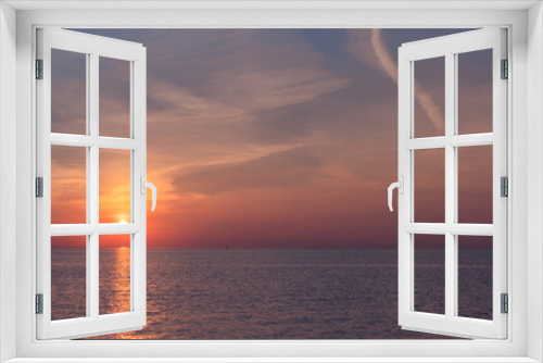 Fototapeta Naklejka Na Ścianę Okno 3D - Sunset in the boundless horizon of the bay.