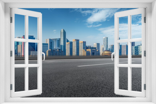 Fototapeta Naklejka Na Ścianę Okno 3D - Empty asphalt road and city skyline and building landscape, China.