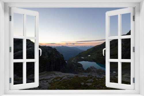 Fototapeta Naklejka Na Ścianę Okno 3D - Wonderful view over a beautiful alpine lake in Switzerland called Schottensee. Epic sunrise over a perfect blue lake.