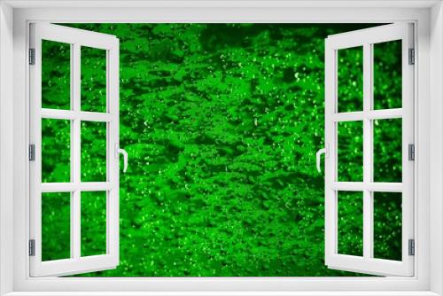 Fototapeta Naklejka Na Ścianę Okno 3D - Green abstract decorative water theme background.  Beautiful festive concept backdrop with copy space, light and dark 3d style, and bokeh light effect with glowing particles.