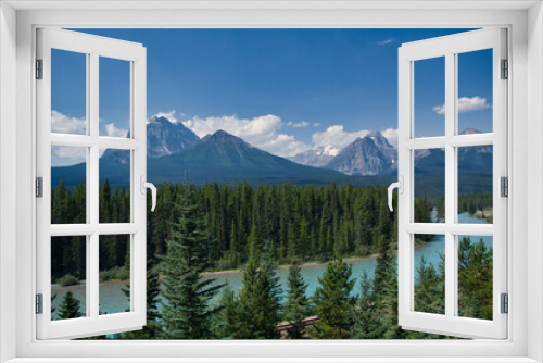 Fototapeta Naklejka Na Ścianę Okno 3D - A panoramic view of the Bow River and Canadian Rocky Mountains.   Banff National Park,  AB Canada 
