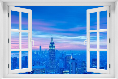 Fototapeta Naklejka Na Ścianę Okno 3D - Night view of New York Manhattan during sunset