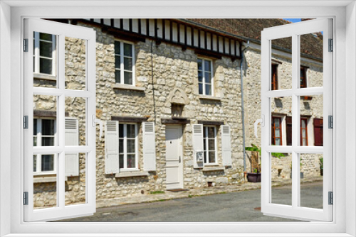 Fototapeta Naklejka Na Ścianę Okno 3D - Montchauvet; France - july 20 2021 : picturesque village