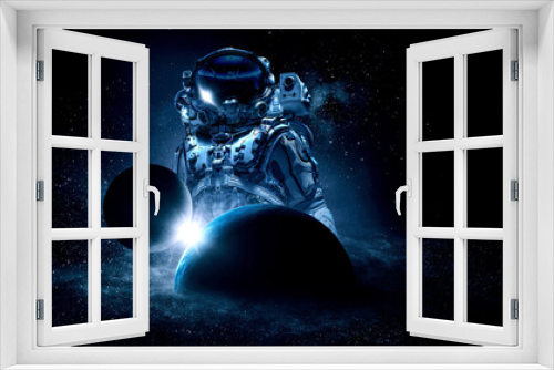 Fototapeta Naklejka Na Ścianę Okno 3D - Astronaut at spacewalk . Mixed media