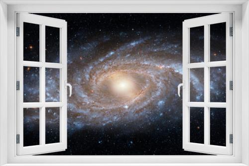 Fototapeta Naklejka Na Ścianę Okno 3D - View from space to a spiral galaxy and stars. Universe filled with stars, nebula and galaxy,. Elements of this image furnished by NASA.