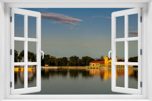 Fototapeta Naklejka Na Ścianę Okno 3D - Yellow building on a pond Denver Colorado with fountain and reflection