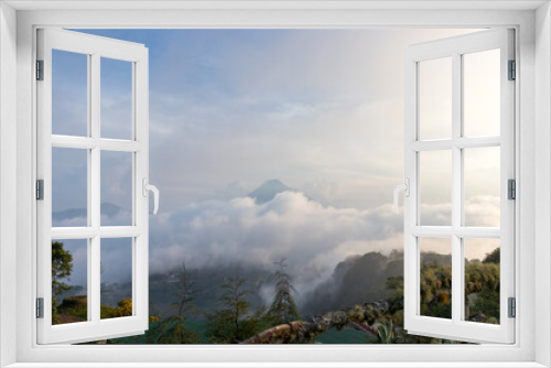 Fototapeta Naklejka Na Ścianę Okno 3D - viewpoint in the mountains of guatemala looking at clouds and volcanoes 
