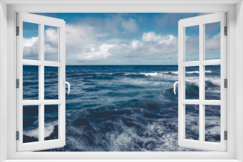 Fototapeta Naklejka Na Ścianę Okno 3D - Blue sea with waves and clear blue sky