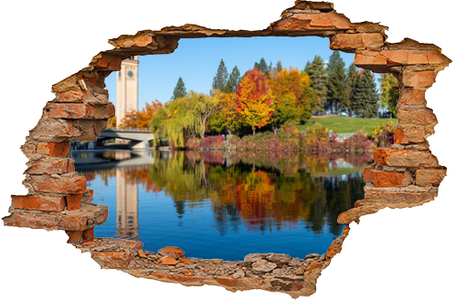 Spokane River Reflecting a Colorful Riverfront Park during Autumn in Downtown Spokane, WA