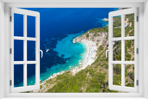 Fototapeta Naklejka Na Ścianę Okno 3D - Aerial drone photo of iconic paradise sandy beach of Agiofili near port of Vasiliki with emerald crystal clear sea and sail boats docked, Lefkada island, Ionian, Greece