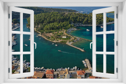 Fototapeta Naklejka Na Ścianę Okno 3D - Aerial drone photo of iconic port of Gaios a natural fjord bay ideal for safe anchorage in island of Paxos, Ionian, Greece