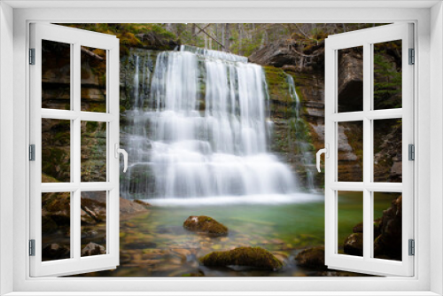 Fototapeta Naklejka Na Ścianę Okno 3D - Silky waterfall in the mystical green forest