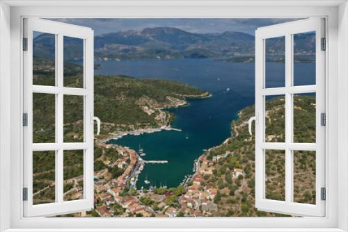 Fototapeta Naklejka Na Ścianę Okno 3D - Aerial drone photo of fjord bay and port of Vathi a natural sail boat anchorage in island of Meganisi, Ionian, Greece