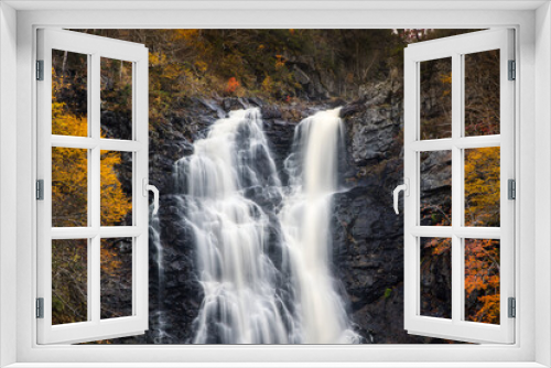 Fototapeta Naklejka Na Ścianę Okno 3D - North River waterfalls, the highest waterfall of Nova Scotia  Gushing water fall in an autumn forest landscape. North River Falls, Cape Breton, Nova Scotia, Canada