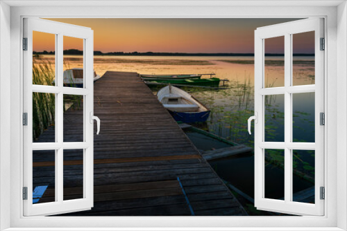 Fototapeta Naklejka Na Ścianę Okno 3D - sunset on the lake and boat in wytyckie lake, poland lubelskie