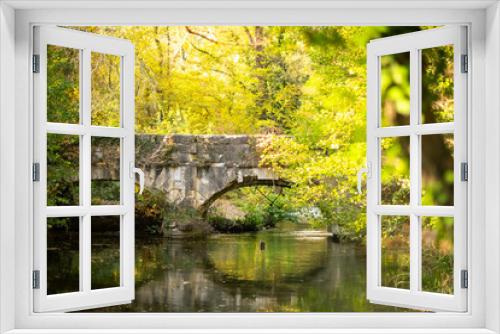Fototapeta Naklejka Na Ścianę Okno 3D - The old aqueduct bridge in the beautiful nature of autumn