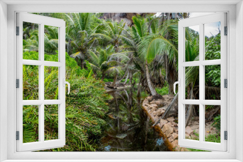 Fototapeta Naklejka Na Ścianę Okno 3D - Beautiful nature of the sea tropical landscape. Exotic tropical nature of the Seychelles, a white beach surrounded by palm trees and granite rocks.
