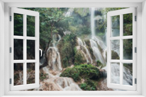 Fototapeta Naklejka Na Ścianę Okno 3D - Erawan waterfall 7th floor with water flowing in tropical rainforest at national park