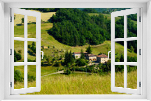 Fototapeta Naklejka Na Ścianę Okno 3D - Rural landscape along the road from Pavullo nel Frignano to Polinago, Emilia-Romagna.