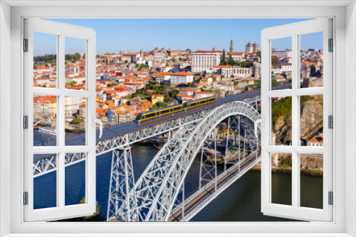 Fototapeta Naklejka Na Ścianę Okno 3D - Porto Portugal with bridge Ponte Dom Luis I Douro river with tram town travel