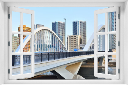 Fototapeta Naklejka Na Ścianę Okno 3D - 環状二号線の隅田川に架かる築地大橋