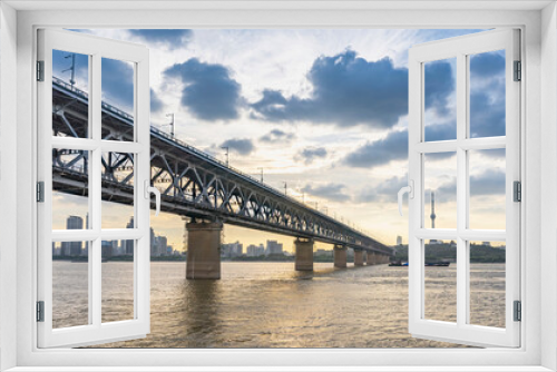 Fototapeta Naklejka Na Ścianę Okno 3D - Sunset view from the first steel bridge of Wuhan above Yangtze river