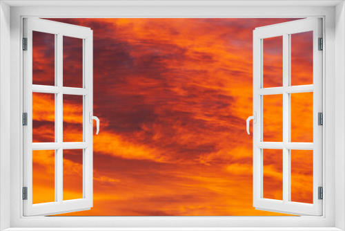 Fototapeta Naklejka Na Ścianę Okno 3D - A beautiful fascinated red like fire cloudscape before sunrise in autumn