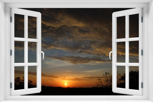 Fototapeta Naklejka Na Ścianę Okno 3D - Beautiful dark orange sunrise in West Texas
