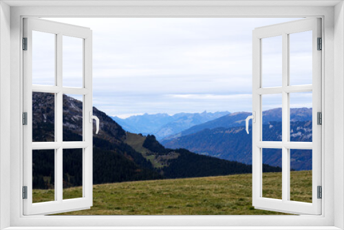 Fototapeta Naklejka Na Ścianę Okno 3D - Mountain panorama seen from Axalp at Bernese Highlands on a grey cloudy autumn day. Photo taken October 19th, 2021, Brienz, Switzerland.