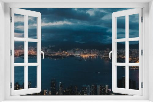 Fototapeta Naklejka Na Ścianę Okno 3D - Panoramic top view of Hong Kong sunset from peak