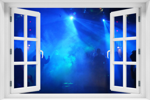 Fototapeta Naklejka Na Ścianę Okno 3D - Dancing people in an underground club