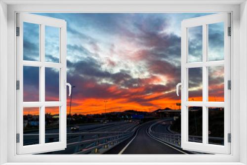 Fototapeta Naklejka Na Ścianę Okno 3D - Puesta de sol en autopista Mataró