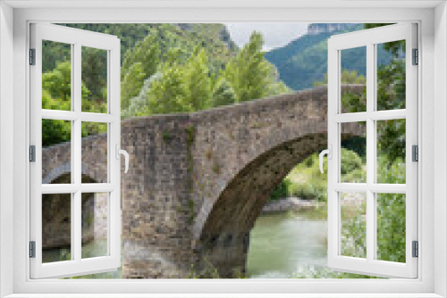 Fototapeta Naklejka Na Ścianę Okno 3D - Medieval bridge over the river Esca in Burgui/Burgi, Navarre, Spain