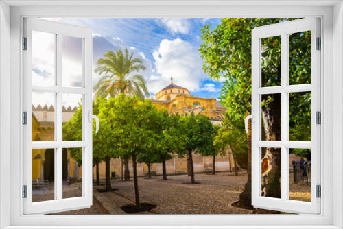 Fototapeta Naklejka Na Ścianę Okno 3D - Garden of orange trees in the courtyard of the Great Mosque, now a Catholic cathedral. UNESCO World Heritage Site, Cordoba, Spain