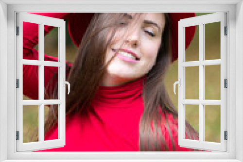 Fototapeta Naklejka Na Ścianę Okno 3D - Smiling white young european woman in red portrait with closed eyes autumn weather