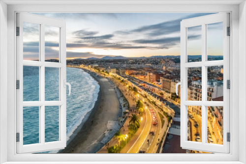 Fototapeta Naklejka Na Ścianę Okno 3D - Coucher de soleil sur la baie des anges à Nice sur la Côte d'Azur
