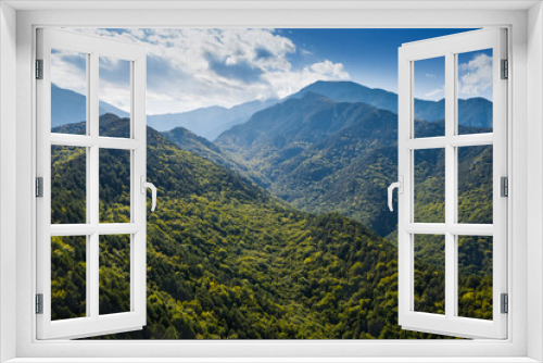 Fototapeta Naklejka Na Ścianę Okno 3D - Greece mountains, close to Mount Olympus. Drone landscape. Green forest, blue cloudy sky