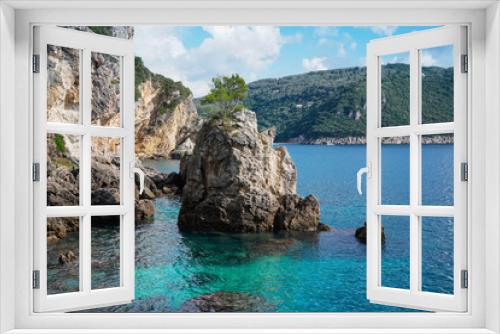 Fototapeta Naklejka Na Ścianę Okno 3D - beautiful bay with rocky beach La Grotta in Paleokastritsa, Corfu island, Greece