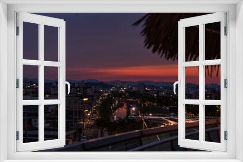 Fototapeta Naklejka Na Ścianę Okno 3D - sunset in the city