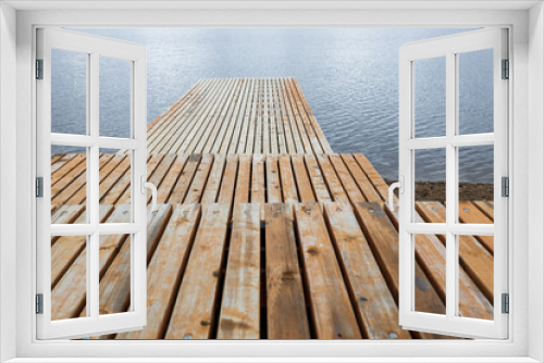 Fototapeta Naklejka Na Ścianę Okno 3D - empty wooden pier on the pond. stepped pier on the water