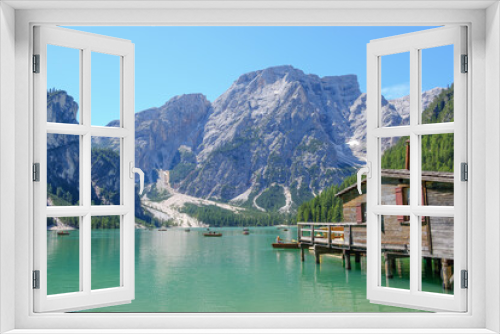 Fototapeta Naklejka Na Ścianę Okno 3D - Lake Braies (also known as Pragser Wildsee or Lago di Braies) in Dolomites Mountains, Sudtirol, Italy. Romantic place with typical wooden boats on the alpine lake. Hiking travel and adventure.