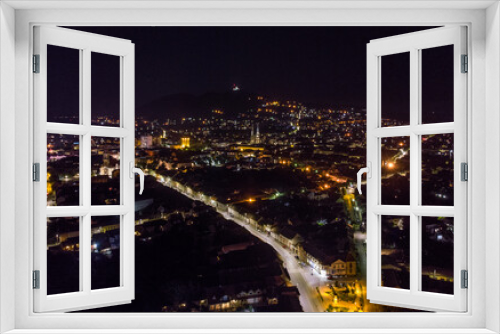 Fototapeta Naklejka Na Ścianę Okno 3D - The town of Vršac at night. Aerial photography. 