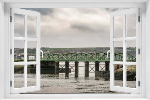 Fototapeta Naklejka Na Ścianę Okno 3D - Fota Bridge on Lough Mahon on hazy cloudy day