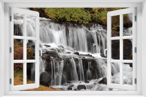 Fototapeta Naklejka Na Ścianę Okno 3D - Hraunfossar, a cascade of small waterfalls flowing into the Hvita river, Vesturland, Iceland.