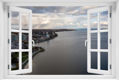 Fototapeta Naklejka Na Ścianę Okno 3D - sunset fall Drone view of Barrie waterfront downtown with blue skies and clouds   