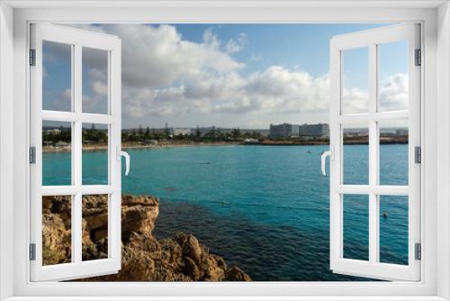 Fototapeta Naklejka Na Ścianę Okno 3D - Crystal clear blue water of Mediterranean sea on Nissi beach in Ayia Napa, Cyprus