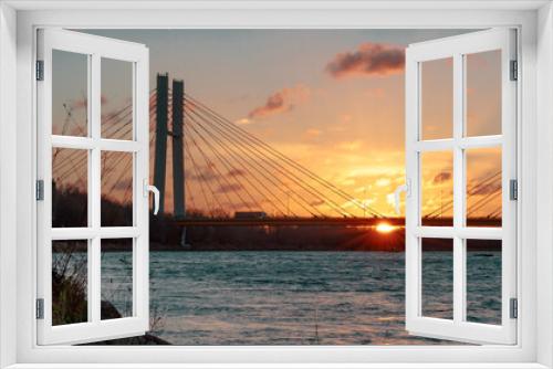 Fototapeta Naklejka Na Ścianę Okno 3D - most wiszący Wisła wschód słońca i chmury