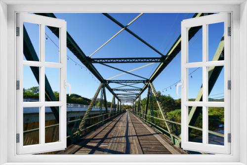 Fototapeta Naklejka Na Ścianę Okno 3D - suspension bridge over river