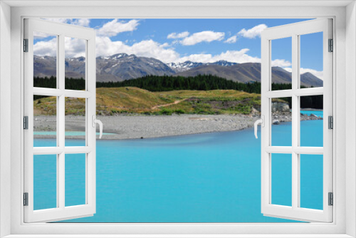 Fototapeta Naklejka Na Ścianę Okno 3D - View of milky blue of Lake Pukaki with beautiful view on Southern Alps in the background in South Island New Zealand